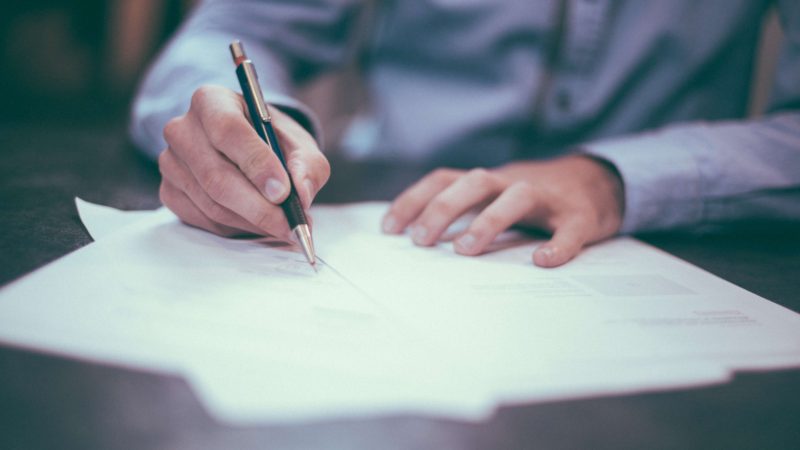 A person signing documents